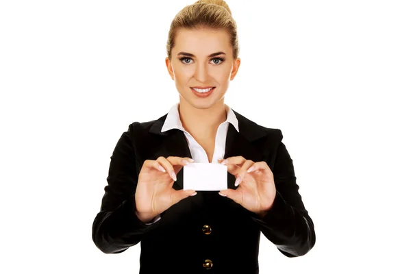 Businesswoman holding business card — Stock Photo, Image