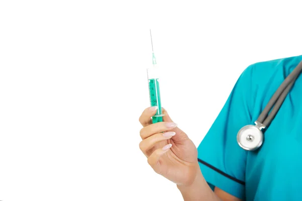 Female nurse or doctor hand holding syringe — Stock Photo, Image