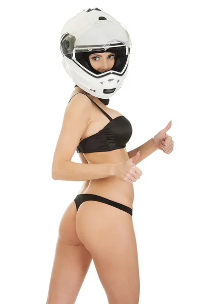 Vrouw in Motorhelm met Duimschroef opwaarts. — Stockfoto