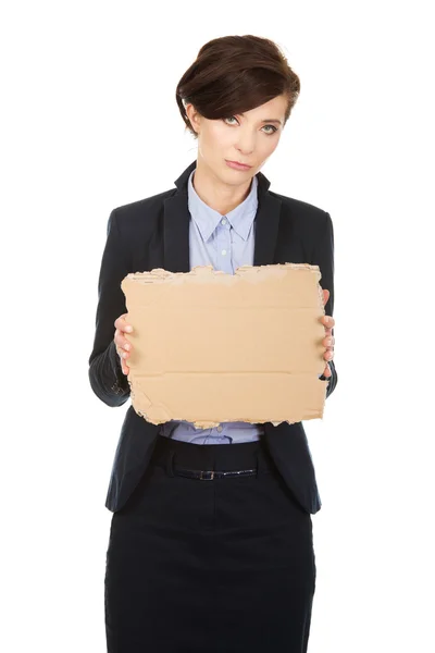 Fired businesswoman with a cardboard. — Stock Photo, Image