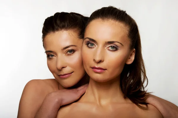 Two sisters with make up. — Stock Photo, Image