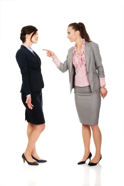 Angry businesswoman accuses her partner. — Stock Photo, Image