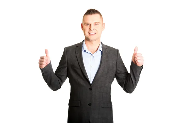 Young businessman gesturing ok sign — Stock Photo, Image