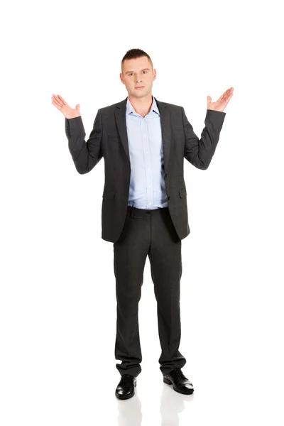 Businessman making undecided gesture — Stock Photo, Image