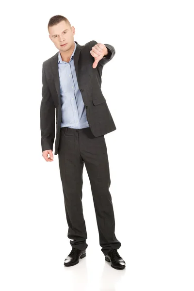 Jonge zakenman gebaren duim omlaag — Stockfoto