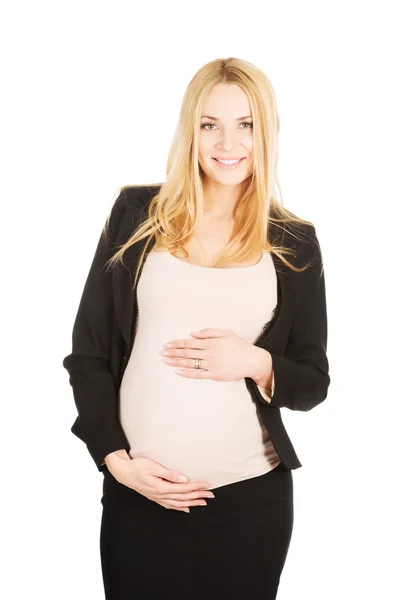 Pregnant woman in business suit. — Stock Photo, Image