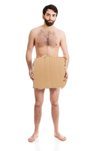 Безнадежный голый мужчина с куском картона . — стоковое фото
