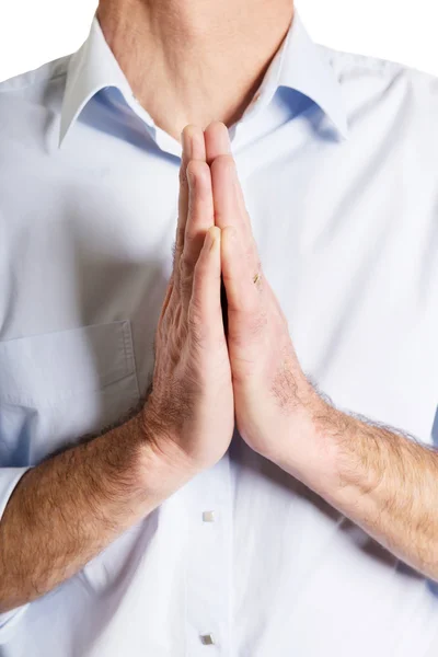 Männerhände zum Gebet geballt — Stockfoto