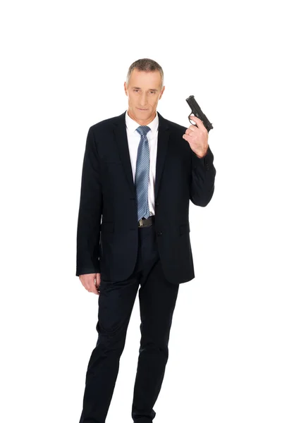 Serious mafia agent with handgun — Stock Photo, Image