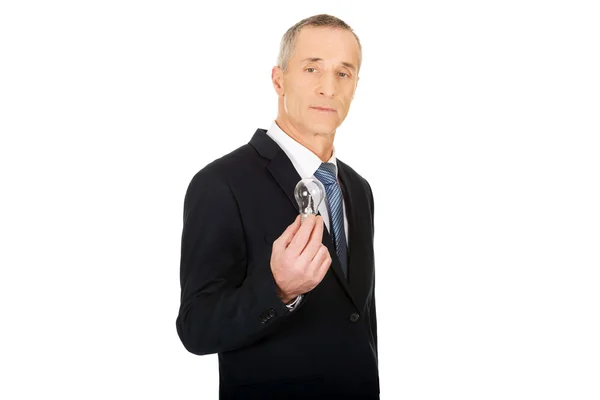 Portrait of businessman with light bulb — Stock Photo, Image