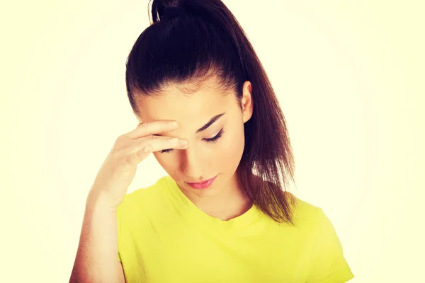 Woman with a headache holding head. — Stock Photo, Image