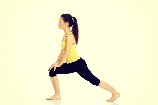 Fitness woman doing stretching exercise. — Stock Photo, Image