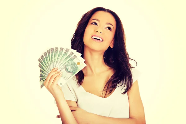 African woman holding polish money. — Stock Photo, Image