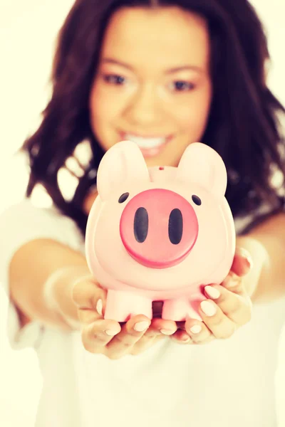 African woman with piggybank. — Stock Photo, Image