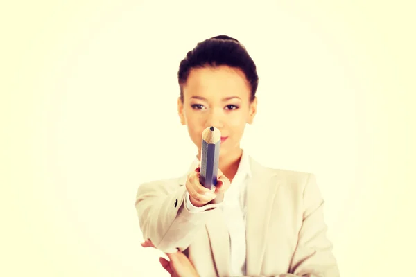 Geschäftsfrau zeigt mit großem Bleistift auf dich. — Stockfoto