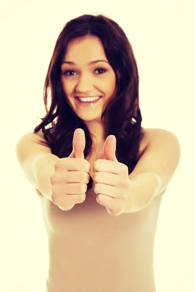 Young woman showing thumbs up. — Stock Photo, Image