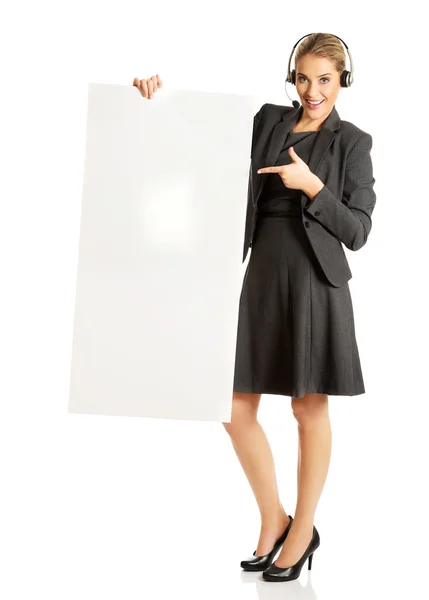 Call center woman holding empty blank — Stock Photo, Image