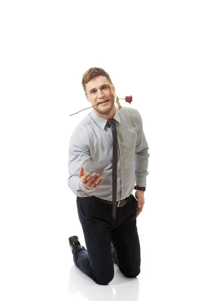 Man holding red rose — Stock Photo, Image