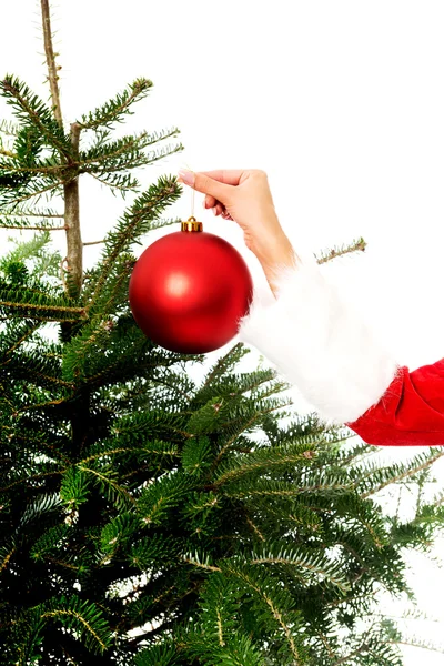 Santa kvinna dekorera julgran — Stockfoto