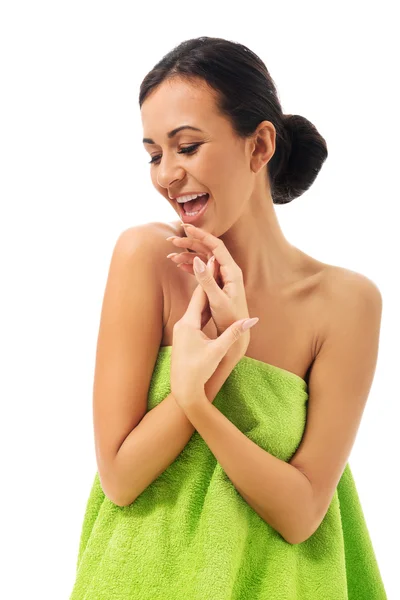 Happy woman wrapped in towel — Stock Photo, Image