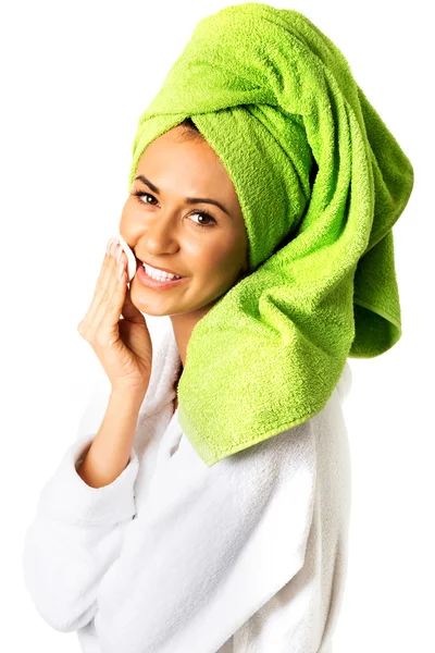 Woman in bathrobe removing makeup — Stock Photo, Image