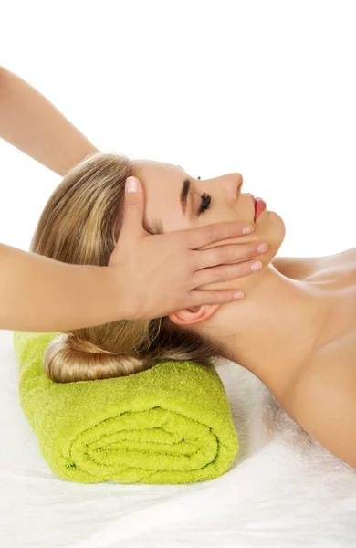 Young woman has face massage. — Stock Photo, Image