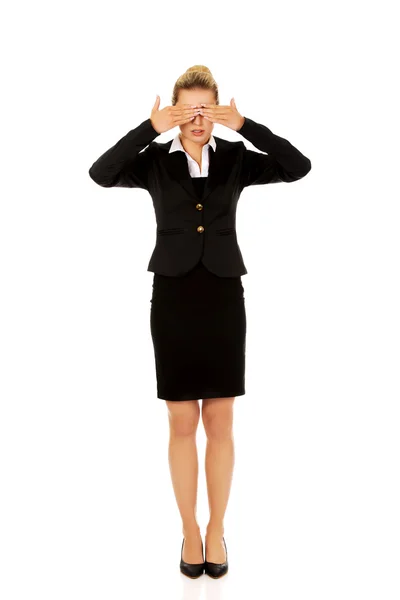 Businesswoman covering eyes — Stock Photo, Image