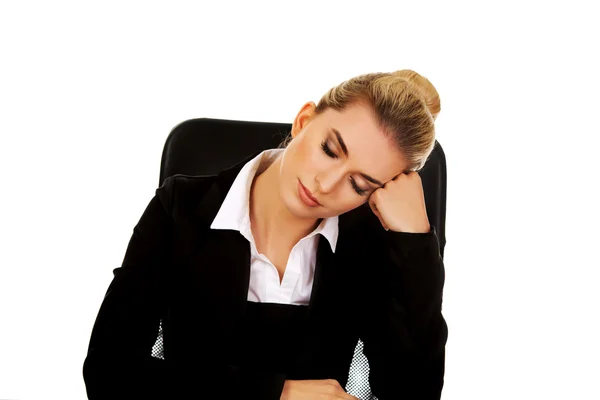 Tired young beautiful blonde businesswoman Stock Picture