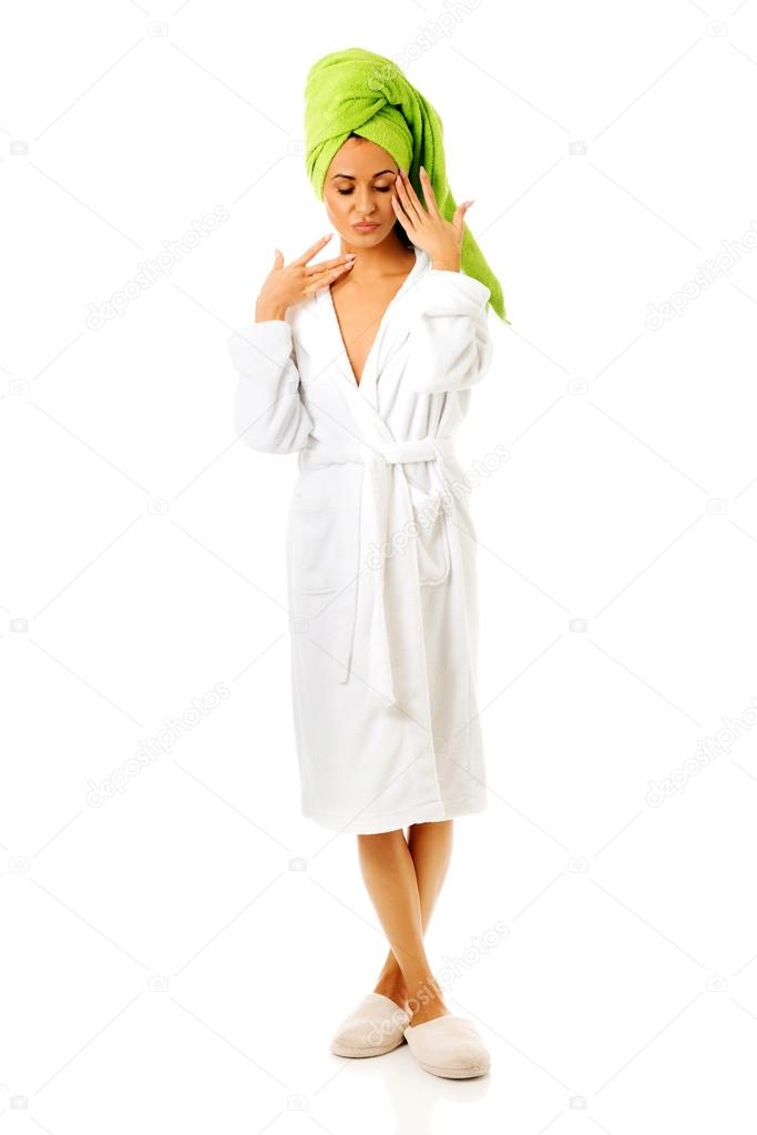 Spa woman standing in bathrobe