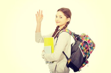 elini sallayarak kız öğrenci.