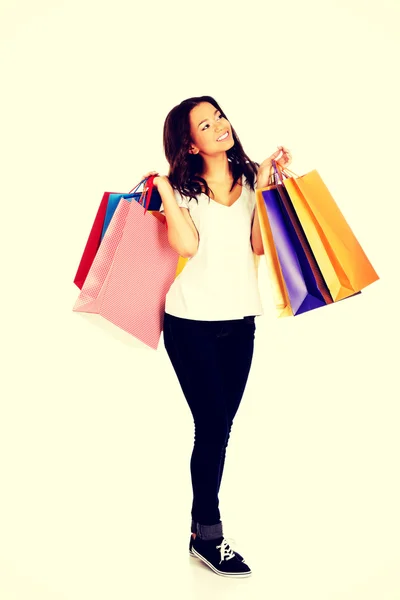 Mulher com presentes de compras — Fotografia de Stock