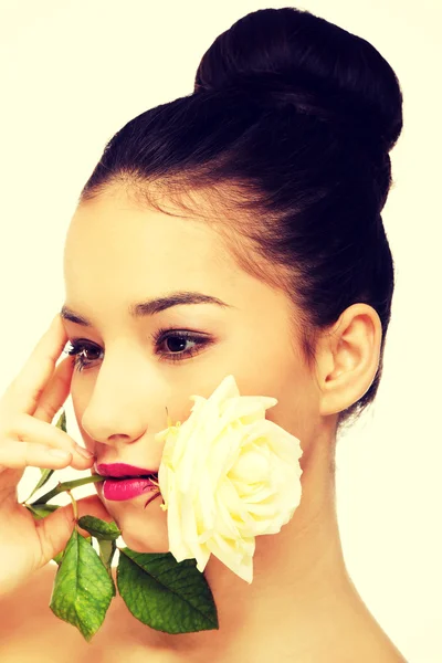 Woman with white rose in mouth. — Stock Photo, Image