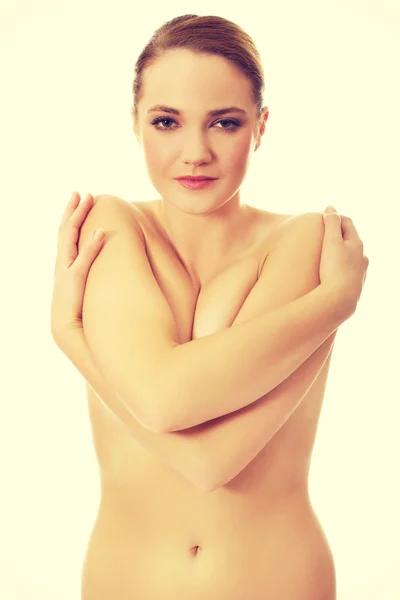 Young topless woman covering her breast. — Stock Photo, Image