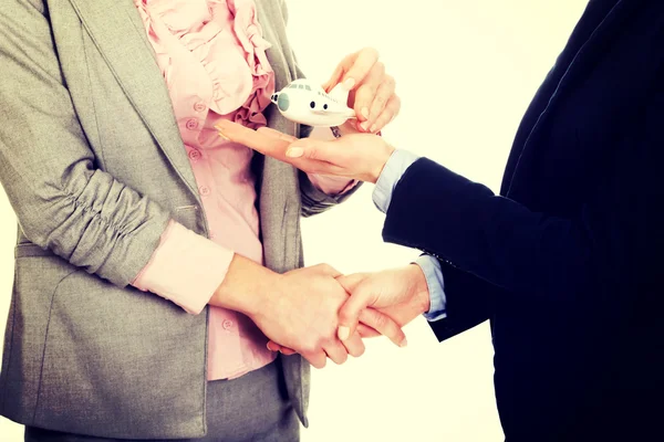 Businesswoman giving a plane to her partner. — Stock Photo, Image