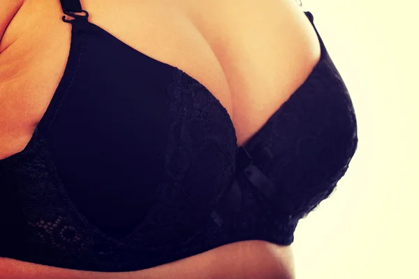 Womans breast in bra. — Stock Photo, Image