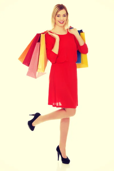 Woman with a lot of shopping bags. — Stock Photo, Image