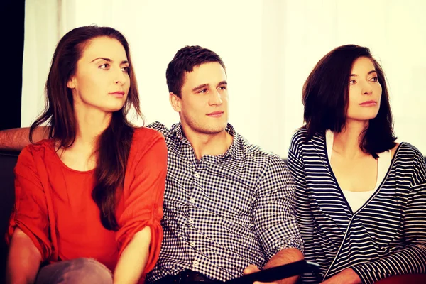 Sisters and brother relaxing at home. — Stock Photo, Image