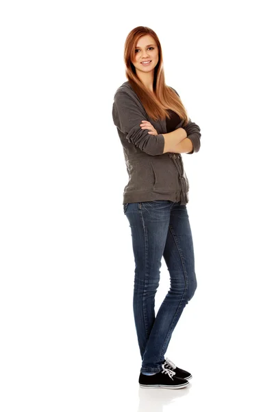 Happy teen woman with folded arms — Stock Photo, Image