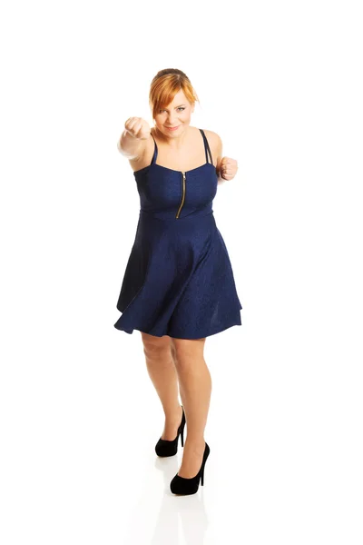 Overweight woman with her fists up — Stock Photo, Image