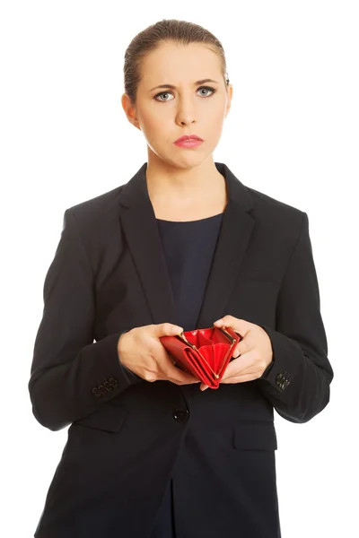 Upset businessswoman holding empty wallet — Stock Photo, Image