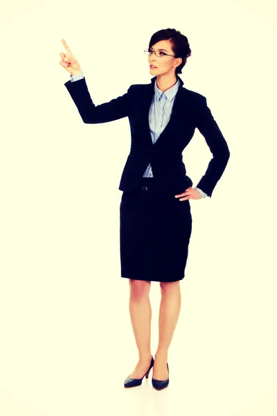 Businesswoman pointing up. — Stock Photo, Image