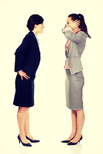 Businesswoman screaming on her partner. — Stock Photo, Image