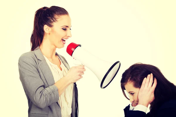 Businesswoman screaming in megaphone. — Stock Photo, Image