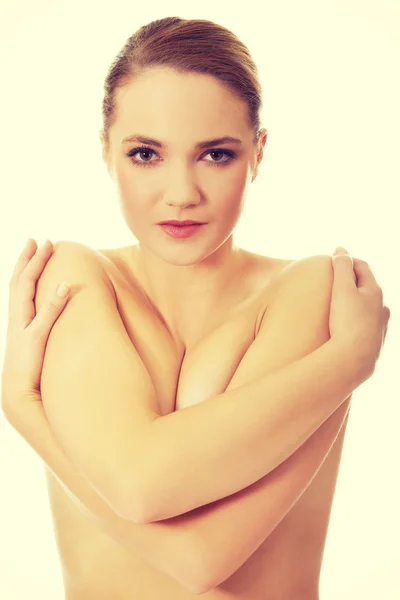 Joven mujer en topless cubriendo su pecho . — Foto de Stock