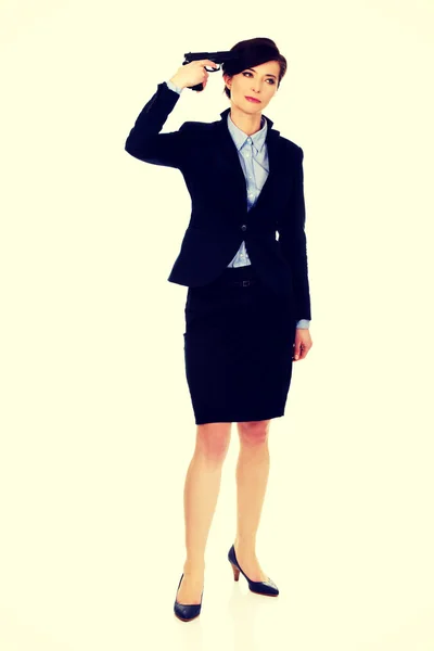 Woman in business suit holding a gun. — Stock Photo, Image