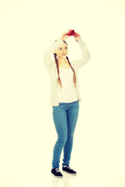 Young unhappy woman with empty purse. — Stock Photo, Image