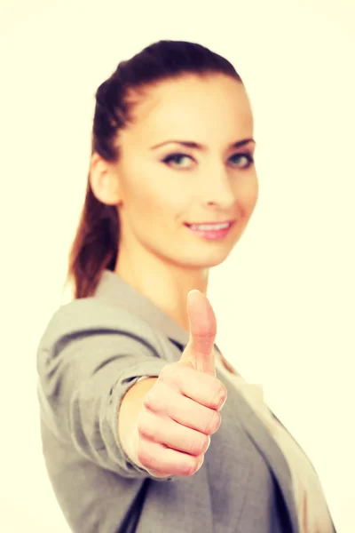 Smiling businesswoman with thumbs up. — Stock Photo, Image