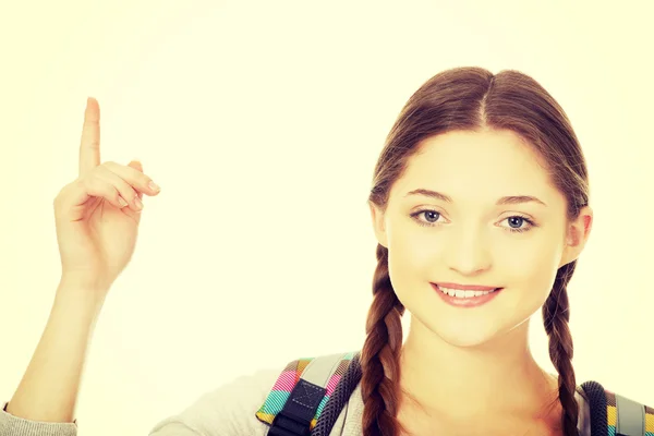 Studentessa indicando su . — Foto Stock