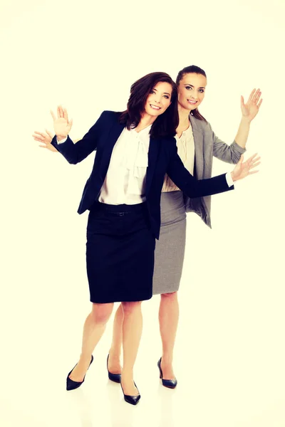 Two businesswoman showing her palms. — Stock Photo, Image