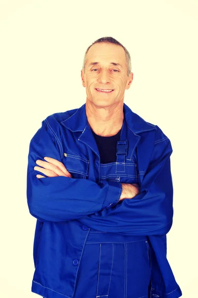 Smiling repairman with folded arms — Stock Photo, Image